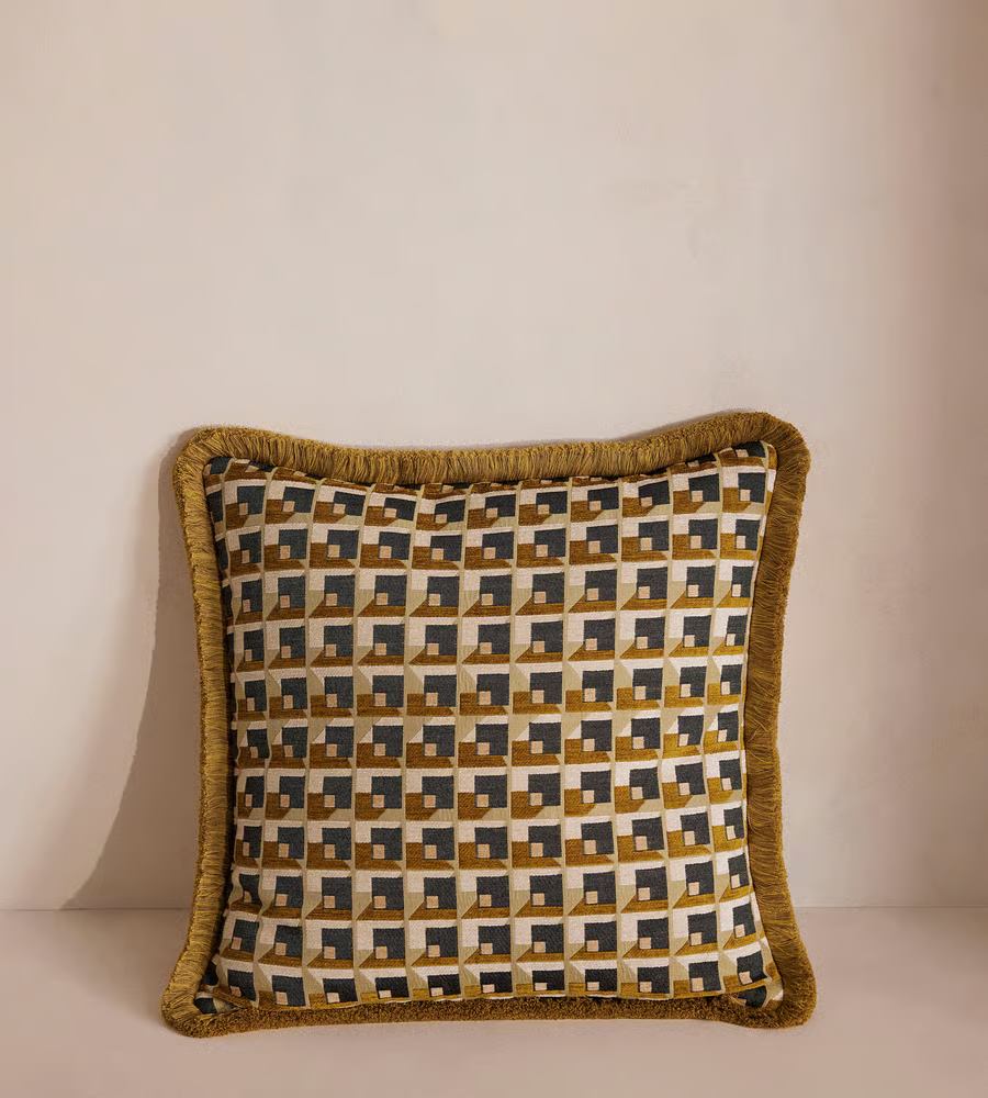 Patterned cushion with fringed edge