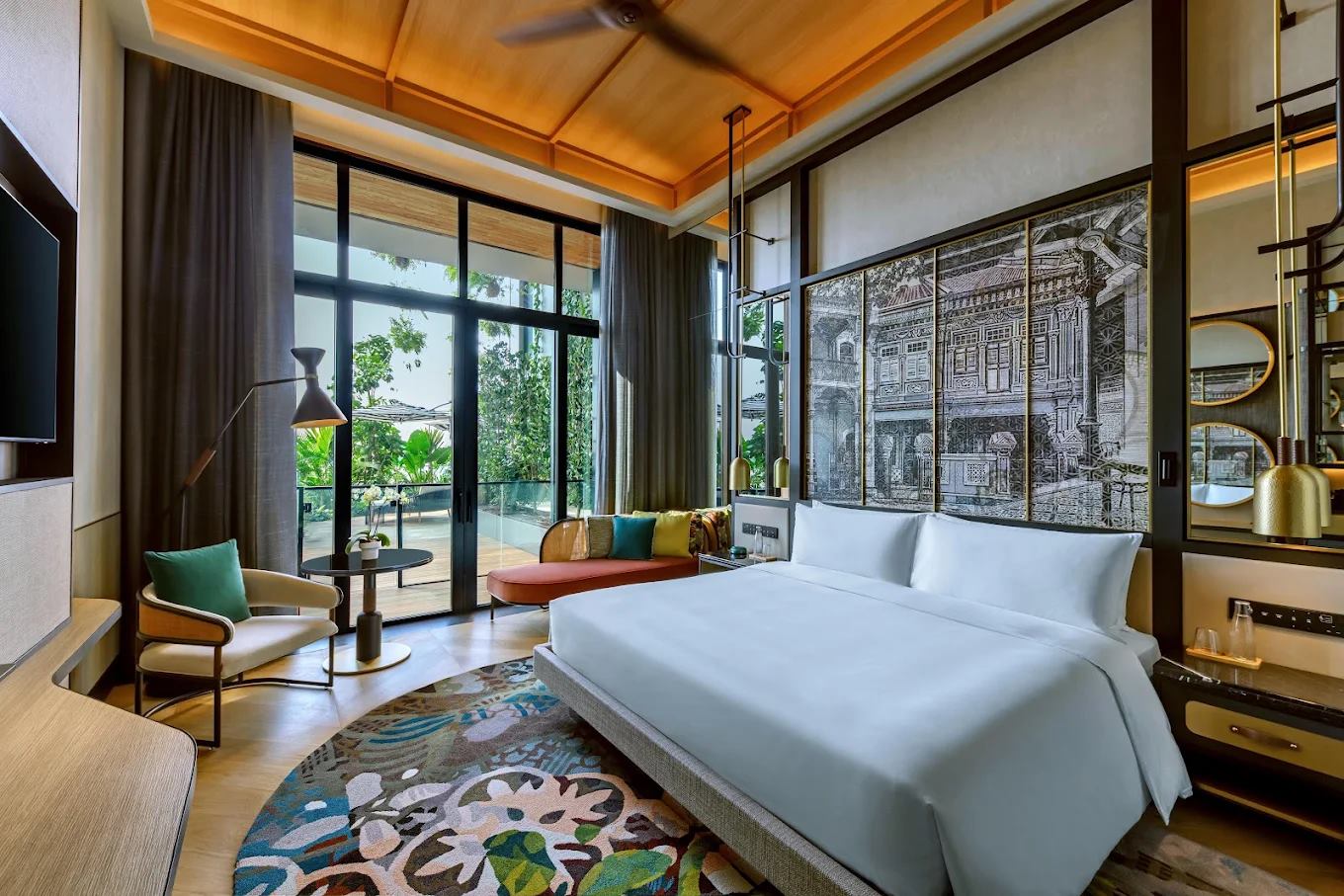 Artyzen Singapore guest room with an etched shophouse screen behind the bed and a patterned rug